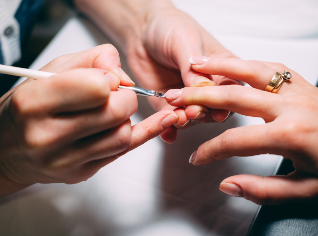 woman getting nails done